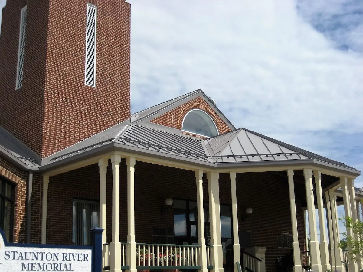 Skilled roofing craftsmen working on a residential roof in Dutch Neck Crossroads